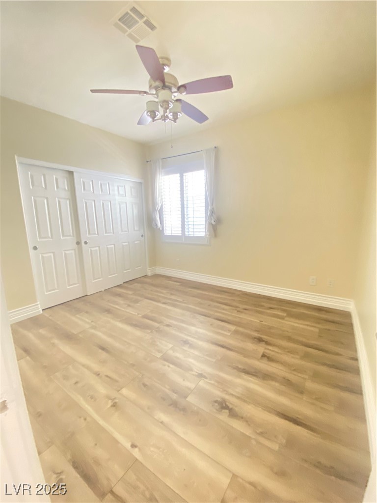 172 Tall Ruff Drive Las Vegas, NV 89148 - Photo 23 of 94 dowFull bath with wood finished floors, vanity, toilet, and shower combination