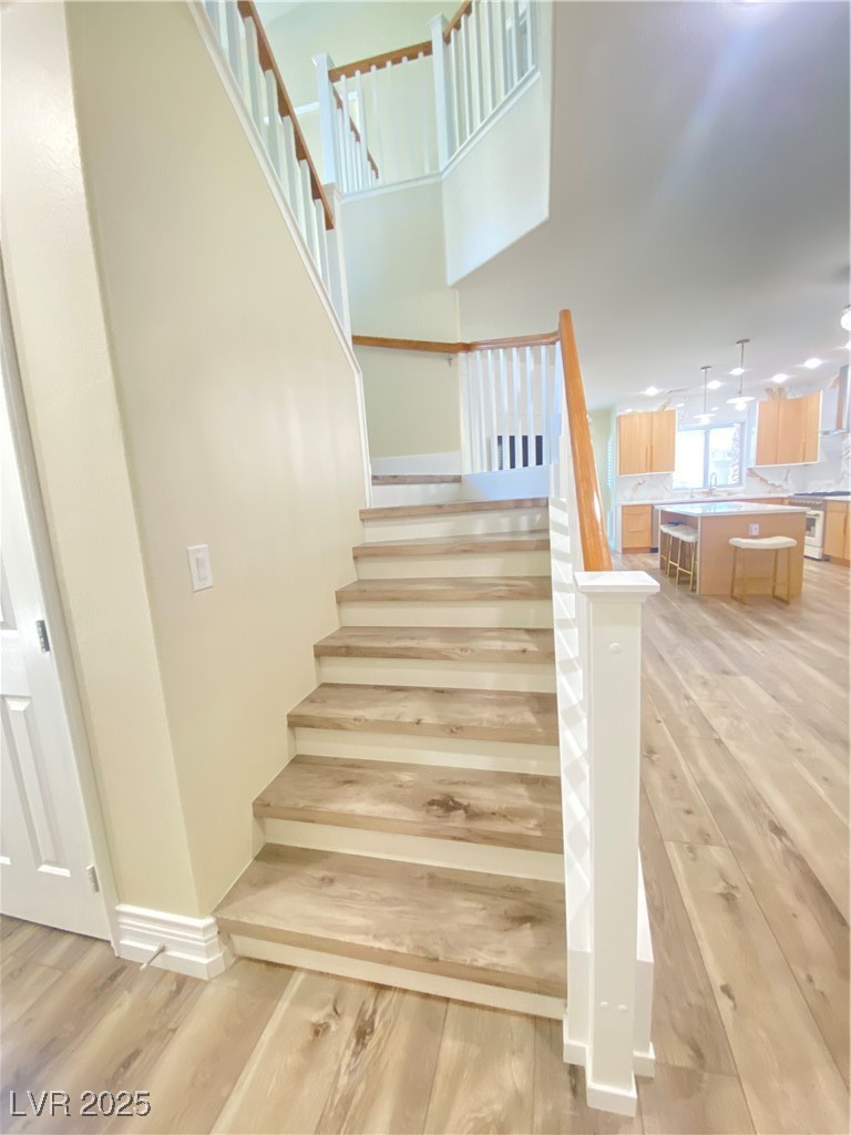 172 Tall Ruff Drive Las Vegas, NV 89148 - Photo 25 of 94 Stairs with wood finished floors