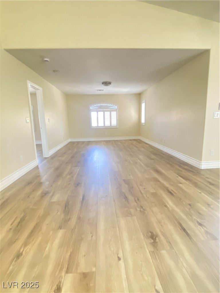 172 Tall Ruff Drive Las Vegas, NV 89148 - Photo 28 of 94 Huge den on top of the stairs with light wood-type flooring and baseboards