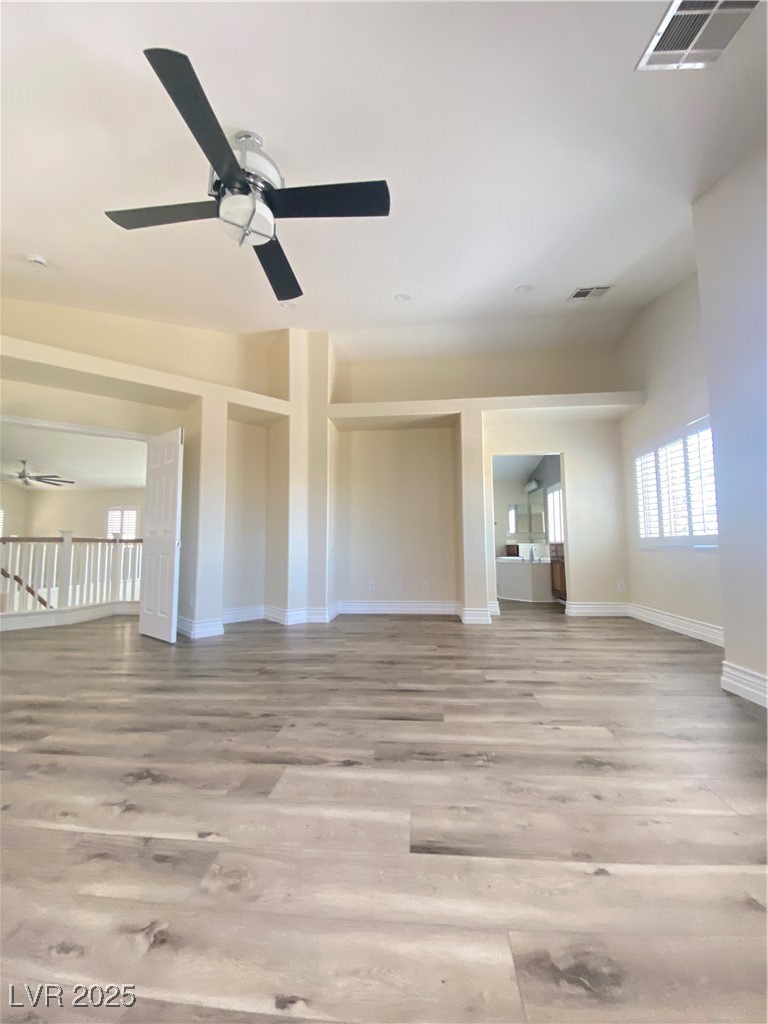 172 Tall Ruff Drive Las Vegas, NV 89148 - Photo 30 of 94 Den with ceiling fan, laminate wood finished floors, and baseboards