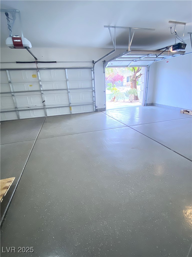 172 Tall Ruff Drive Las Vegas, NV 89148 - Photo 52 of 94 Garage featuring a garage door opener