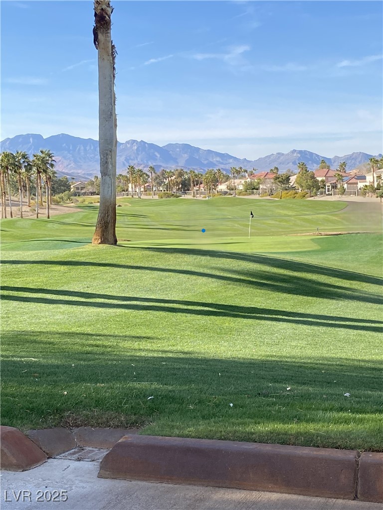 172 Tall Ruff Drive Las Vegas, NV 89148 - Photo 55 of 94 Surrounding community featuring a mountain view, a lawn, and golf course view