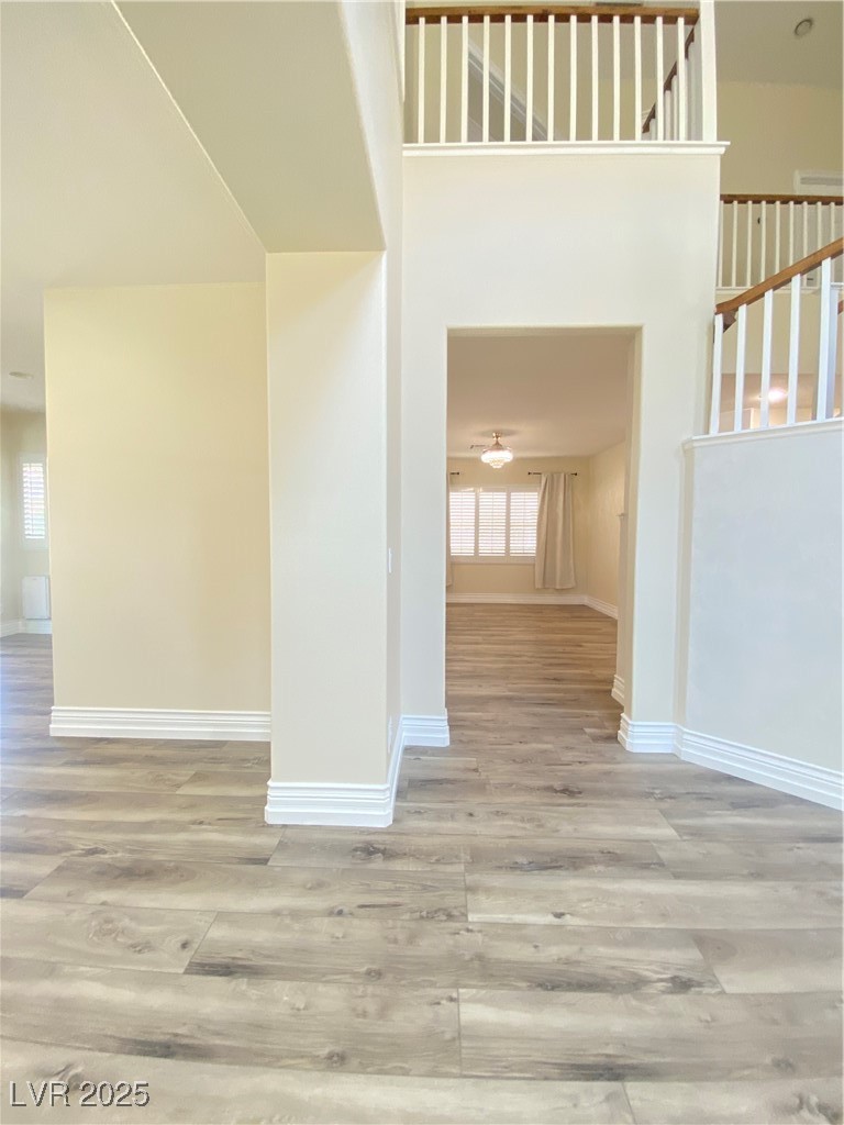 172 Tall Ruff Drive Las Vegas, NV 89148 - Photo 10 of 94 Foyer entrance featuring wood finished floors and baseboards