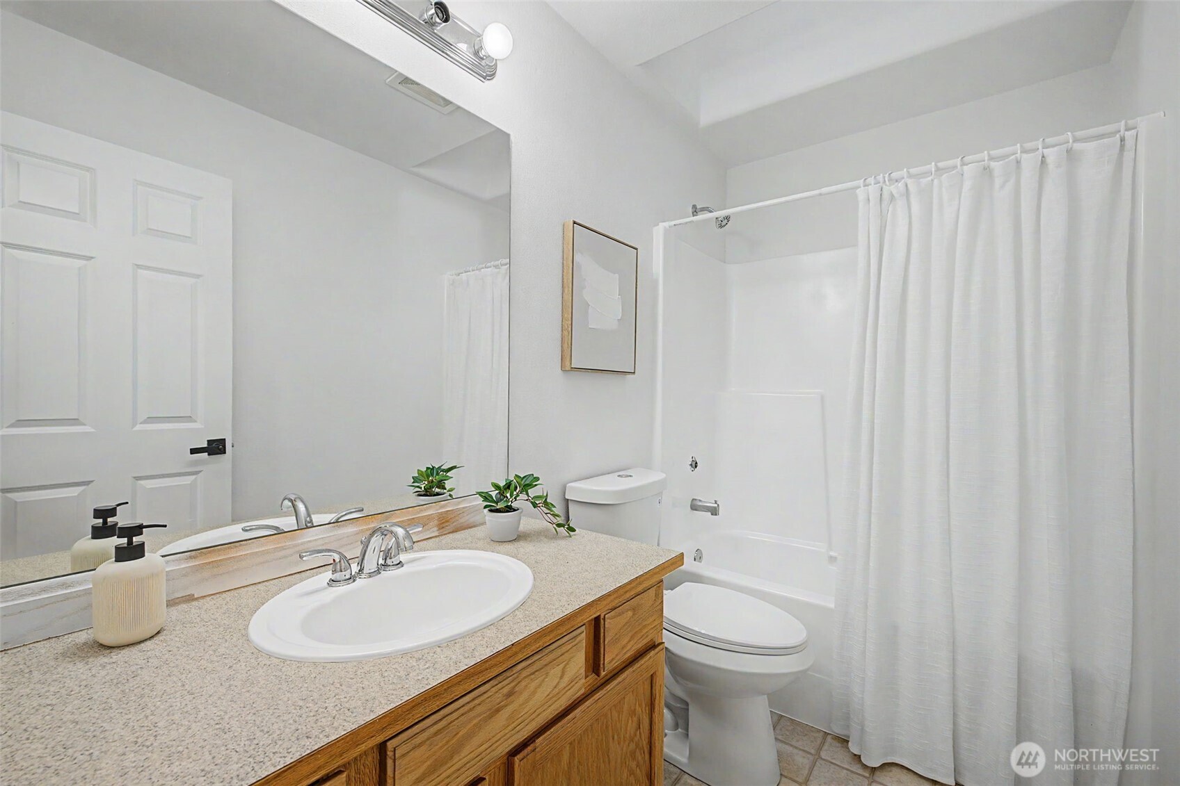 4124 214th Street Southwest, Unit C Mountlake Terrace, WA 98043 - Photo 13 of 20 a bathroom with a granite countertop sink toilet and shower