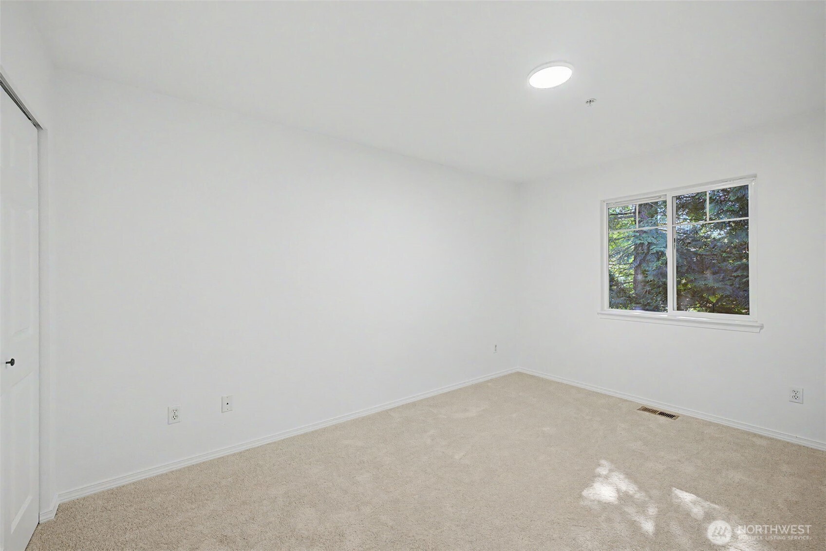 4124 214th Street Southwest, Unit C Mountlake Terrace, WA 98043 - Photo 14 of 20 an empty room with windows