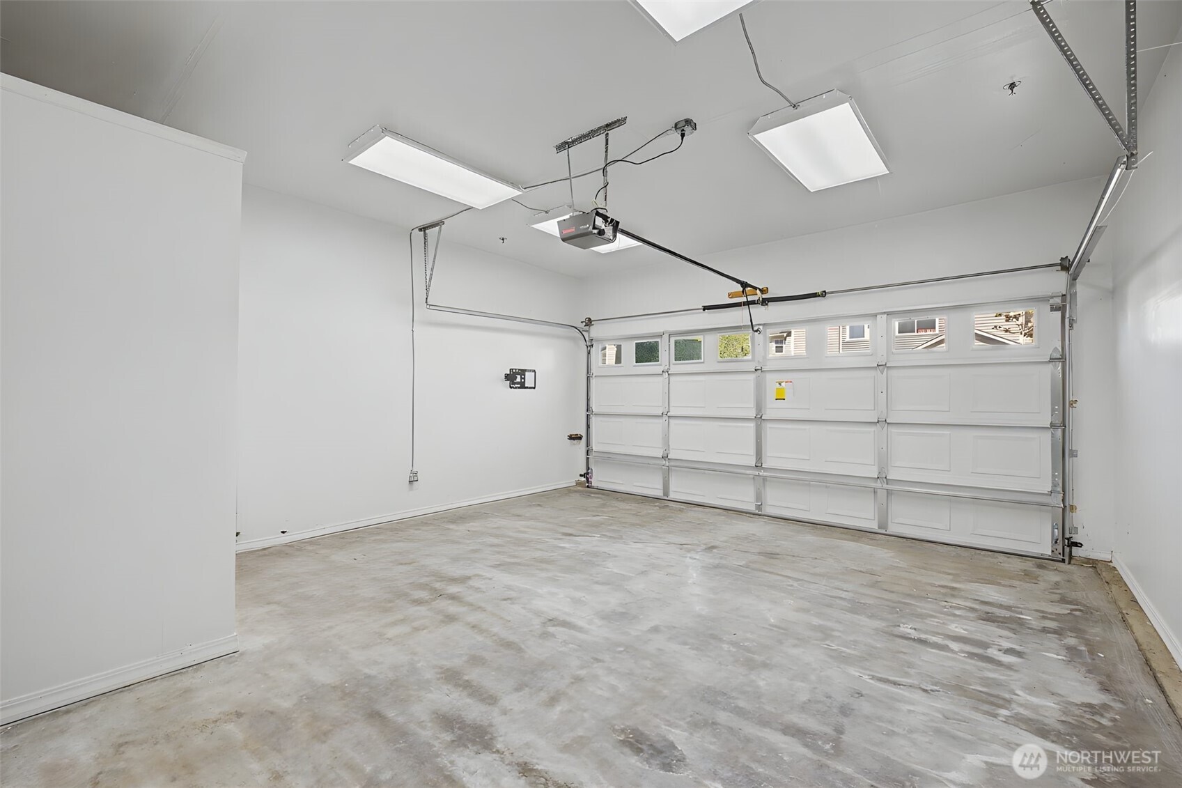 4124 214th Street Southwest, Unit C Mountlake Terrace, WA 98043 - Photo 18 of 20 a view of a garage