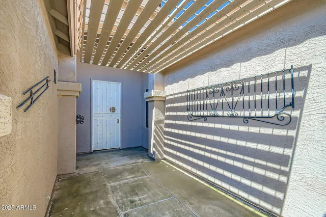 a view of front door with wooden floor