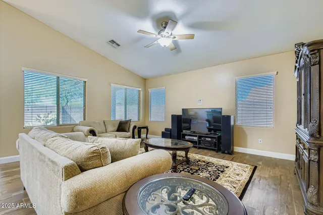 a living room with furniture and a couch