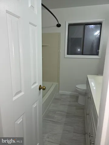 a balcony with wooden floor