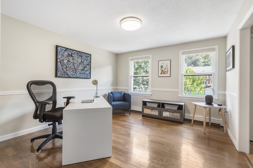 61 Sunset Drive Milford, MA 01757 - Photo 32 of 42 a living room with furniture and a window