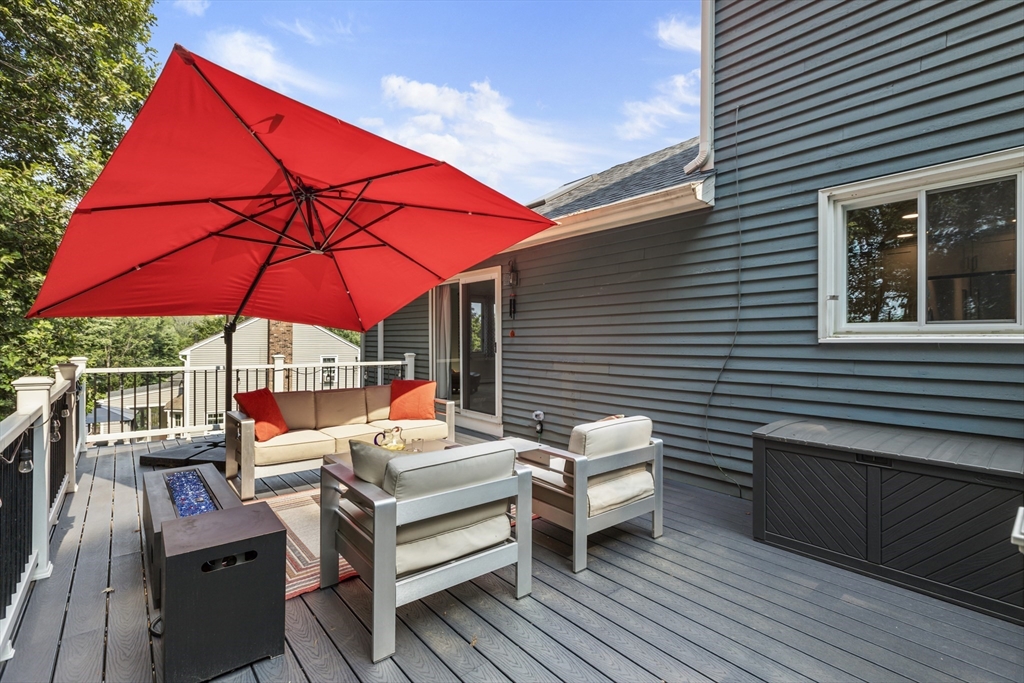 61 Sunset Drive Milford, MA 01757 - Photo 36 of 42 a view of deck with patio
