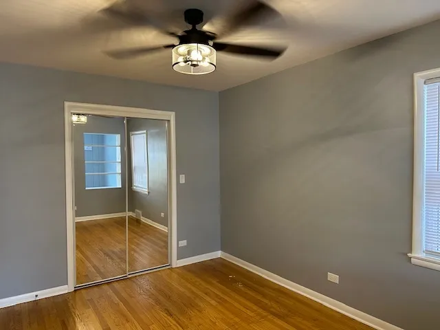 a view of an empty room with a bathroom