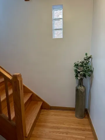 a view of entryway with wooden floor