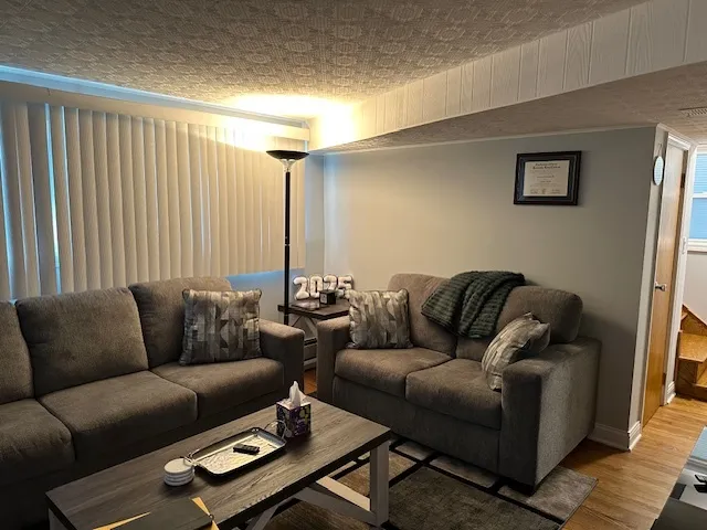 a living room with furniture and a couch