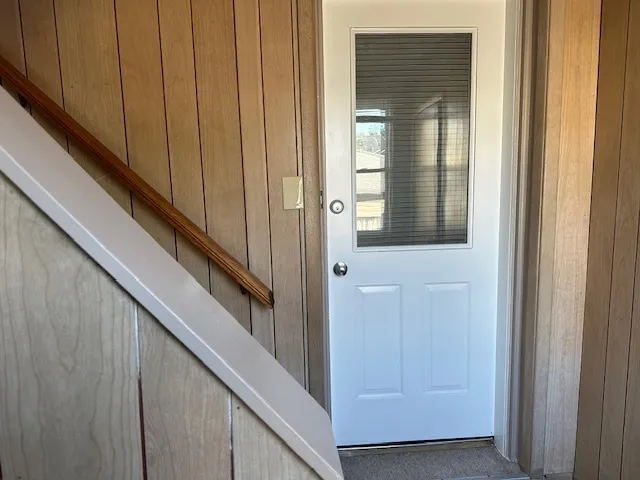 a view of wooden floor and staircase