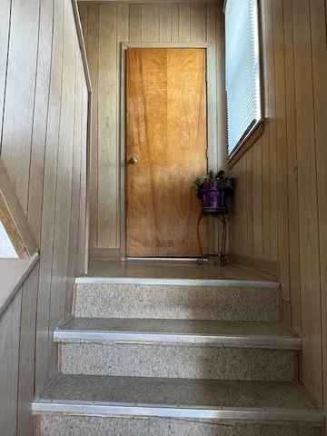 a bathroom with a bathtub and shower