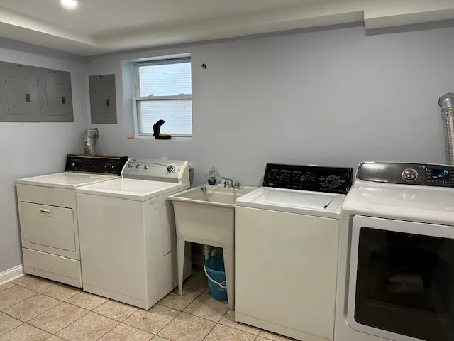 a utility room with dryer and washer