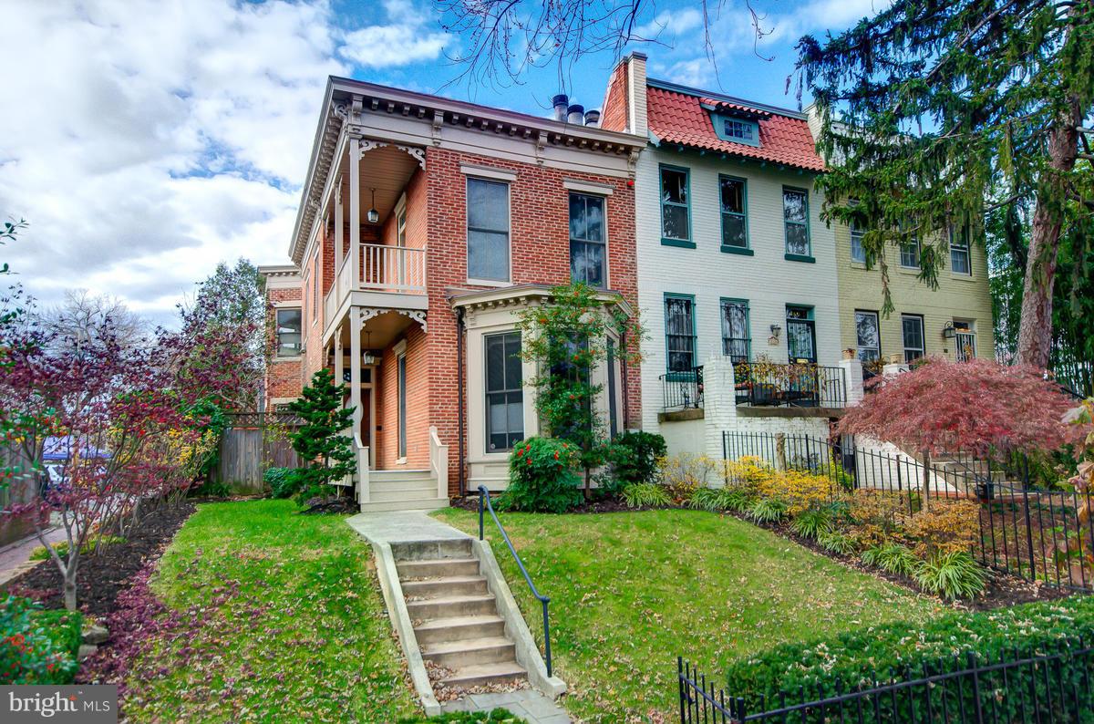 214 11th Street Northeast Washington, DC 20002 - Photo 21 of 30 a front view of a house with garden