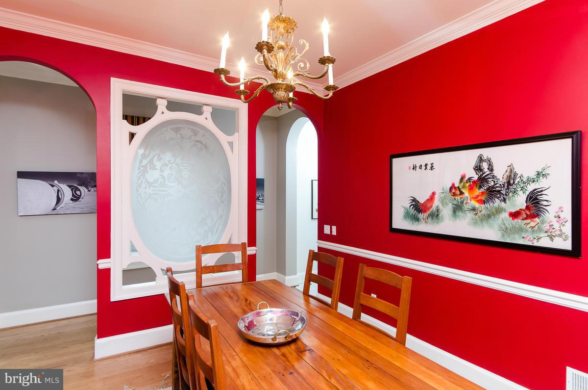 214 11th Street Northeast Washington, DC 20002 - Photo 6 of 30 a view of a dining room with furniture and wooden floor