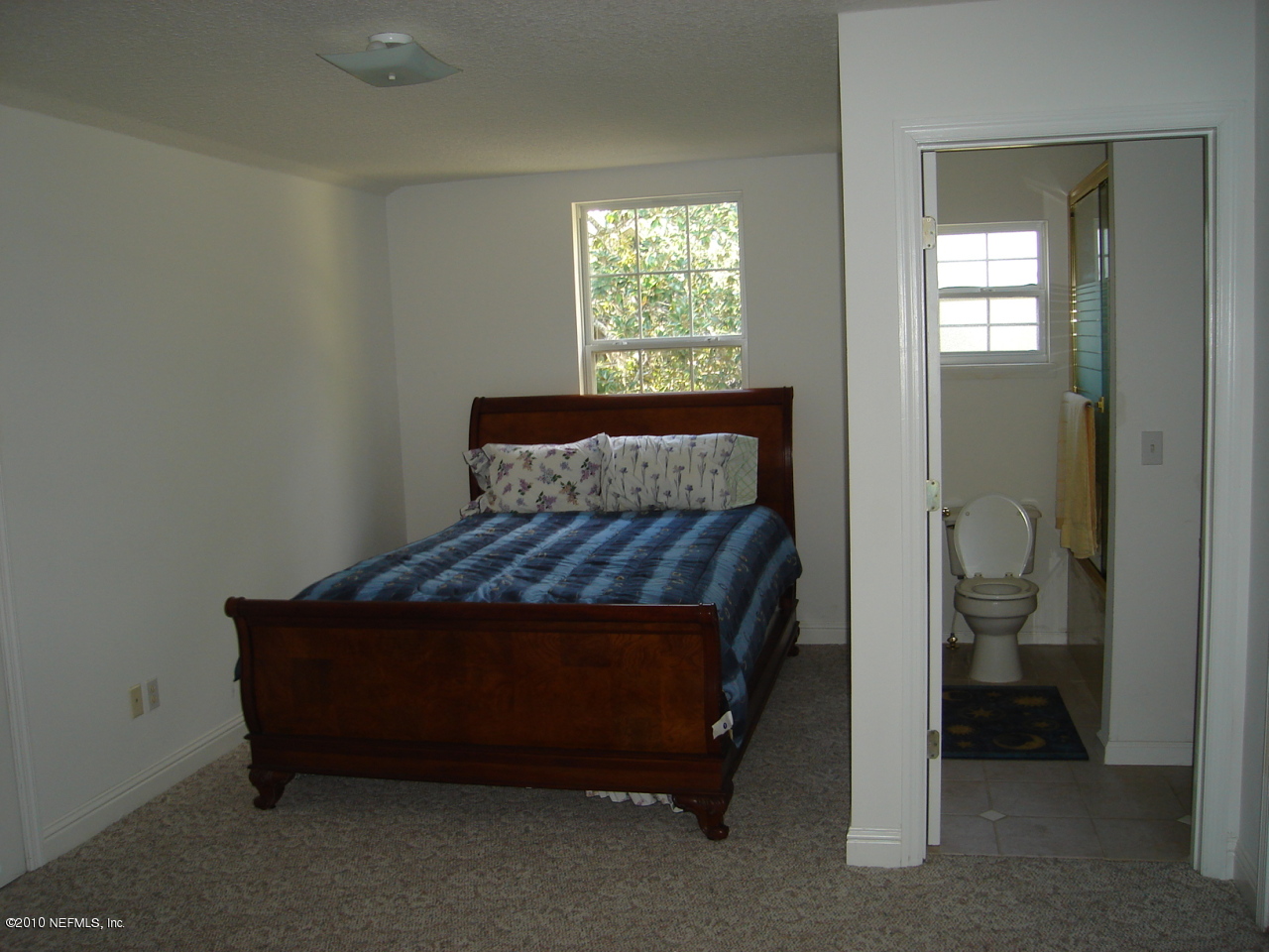 322 Broward Road Jacksonville, FL 32218 - Photo 10 of 20 upstairs bedroom and full bath