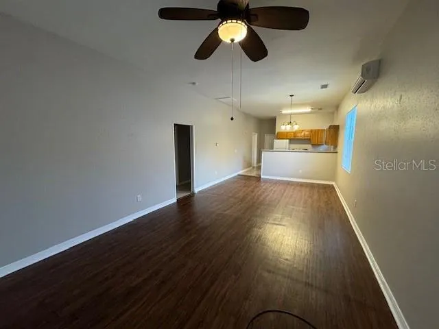 a view of an empty room and window