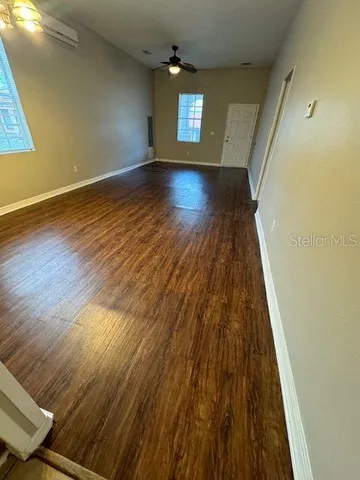 wooden floor in a hall with an entryway