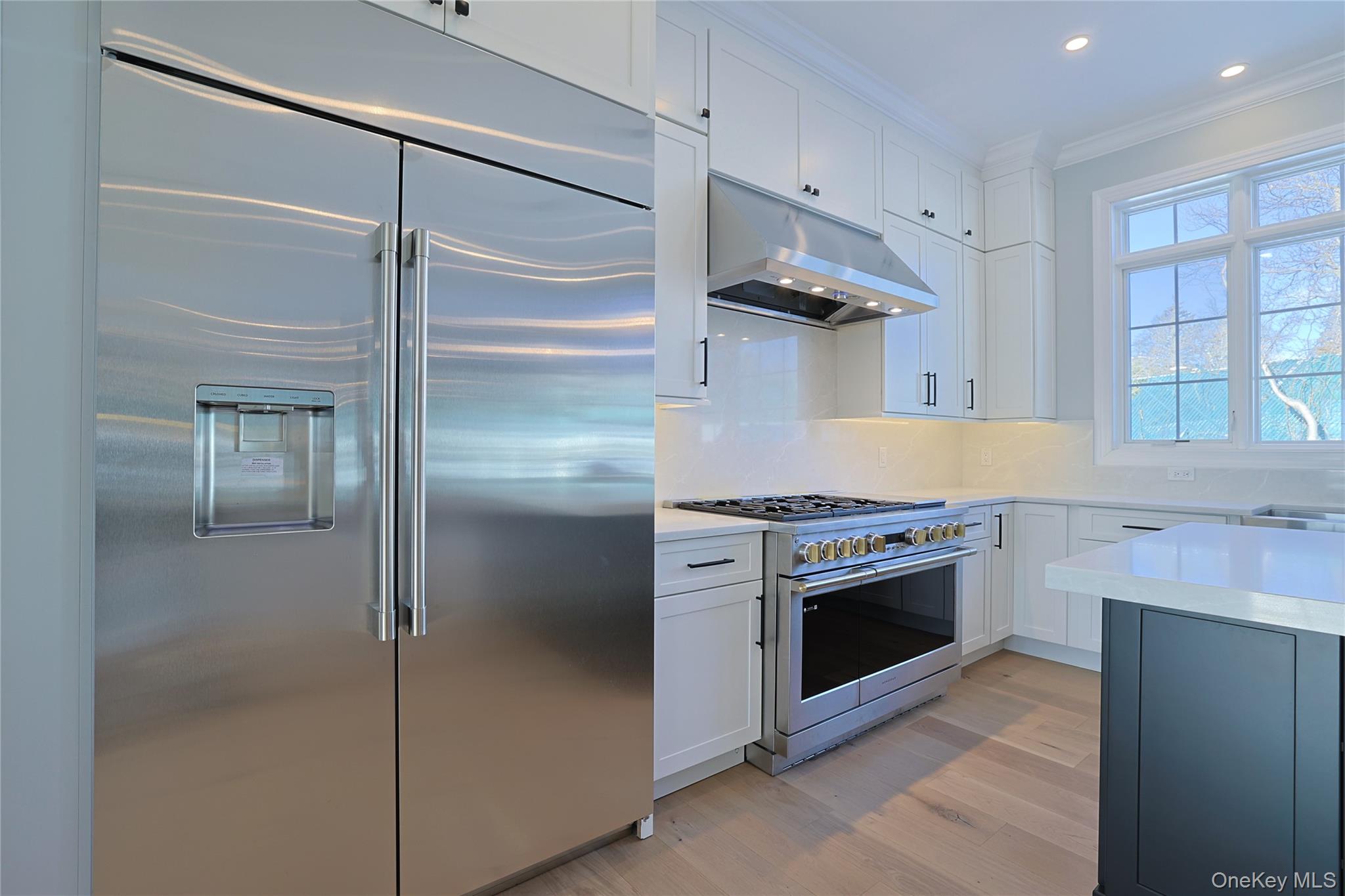 41 Croton Dam Road Ossining, NY 10562 - Photo 17 of 30 a kitchen with stainless steel appliances granite countertop a refrigerator and a stove