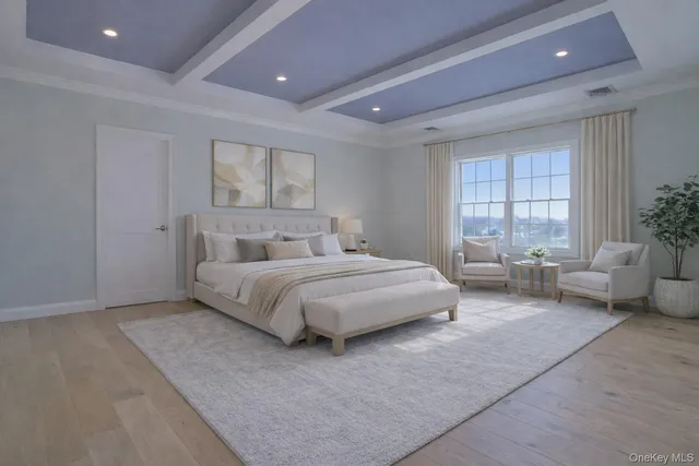 a bedroom with a large bed and a couch