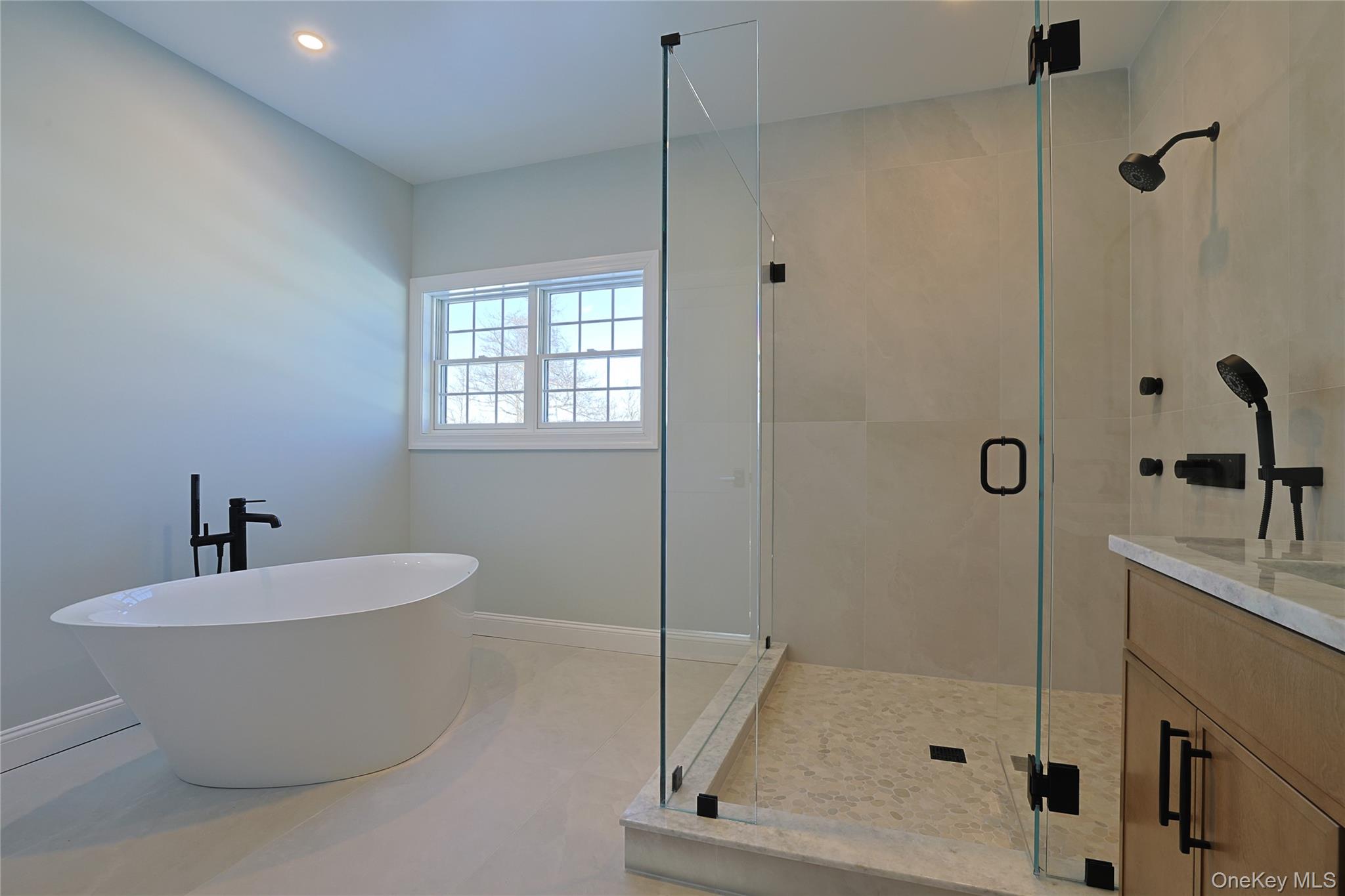 41 Croton Dam Road Ossining, NY 10562 - Photo 24 of 30 a bathroom with a bathtub and shower