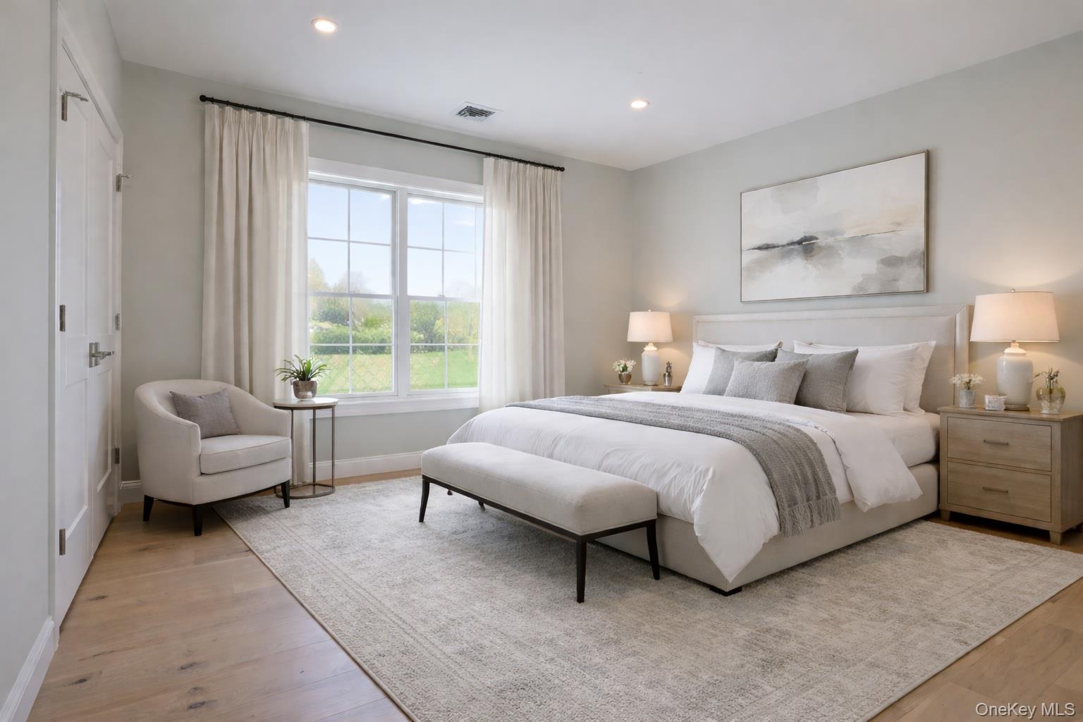 41 Croton Dam Road Ossining, NY 10562 - Photo 26 of 30 a spacious bedroom with a bed and glass walk in closet