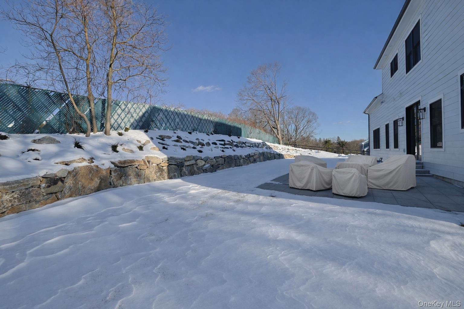 41 Croton Dam Road Ossining, NY 10562 - Photo 7 of 30 a view of backyard with a table and chairs