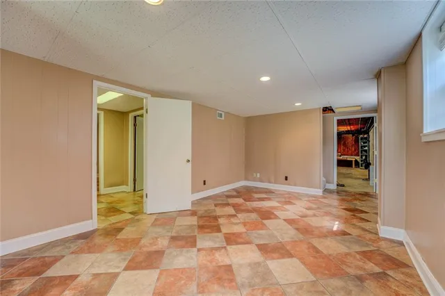 a backyard of a house with lots of green space