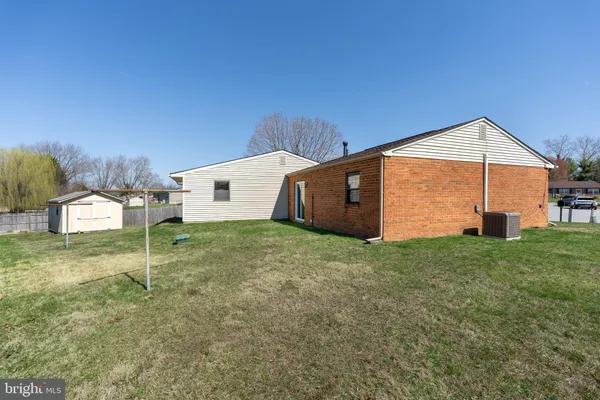 a house view with a backyard space