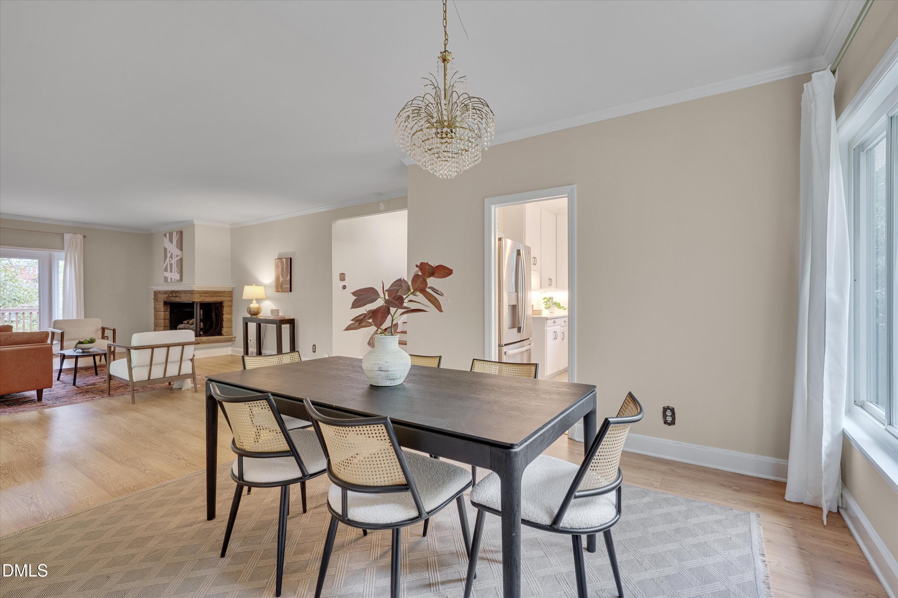 1617 Shawnee Street Durham, NC 27701 - Photo 25 of 56 a view of a dining room with furniture and wooden floor
