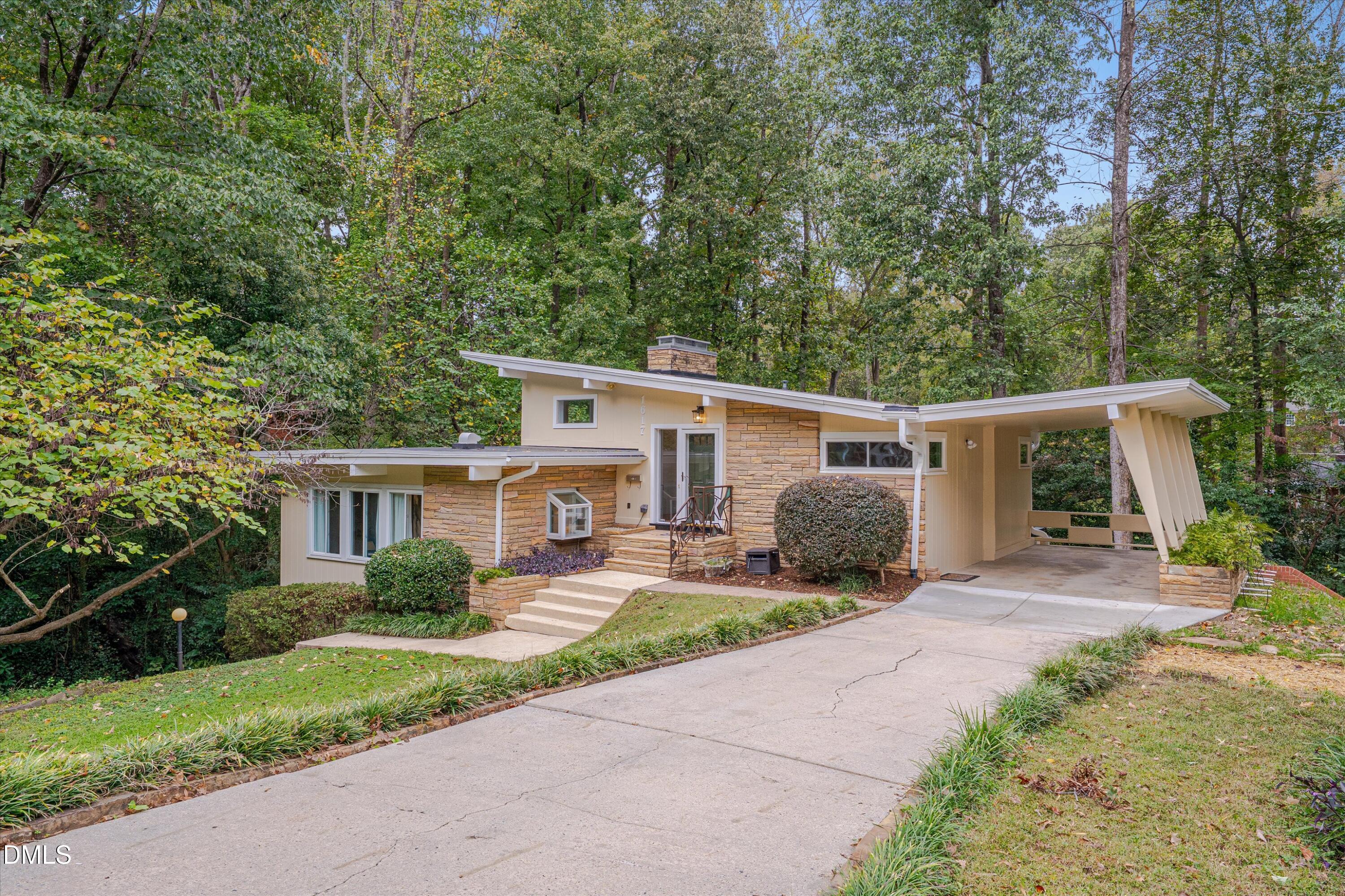1617 Shawnee Street Durham, NC 27701 - Photo 3 of 56 a view of a house with backyard and a trees