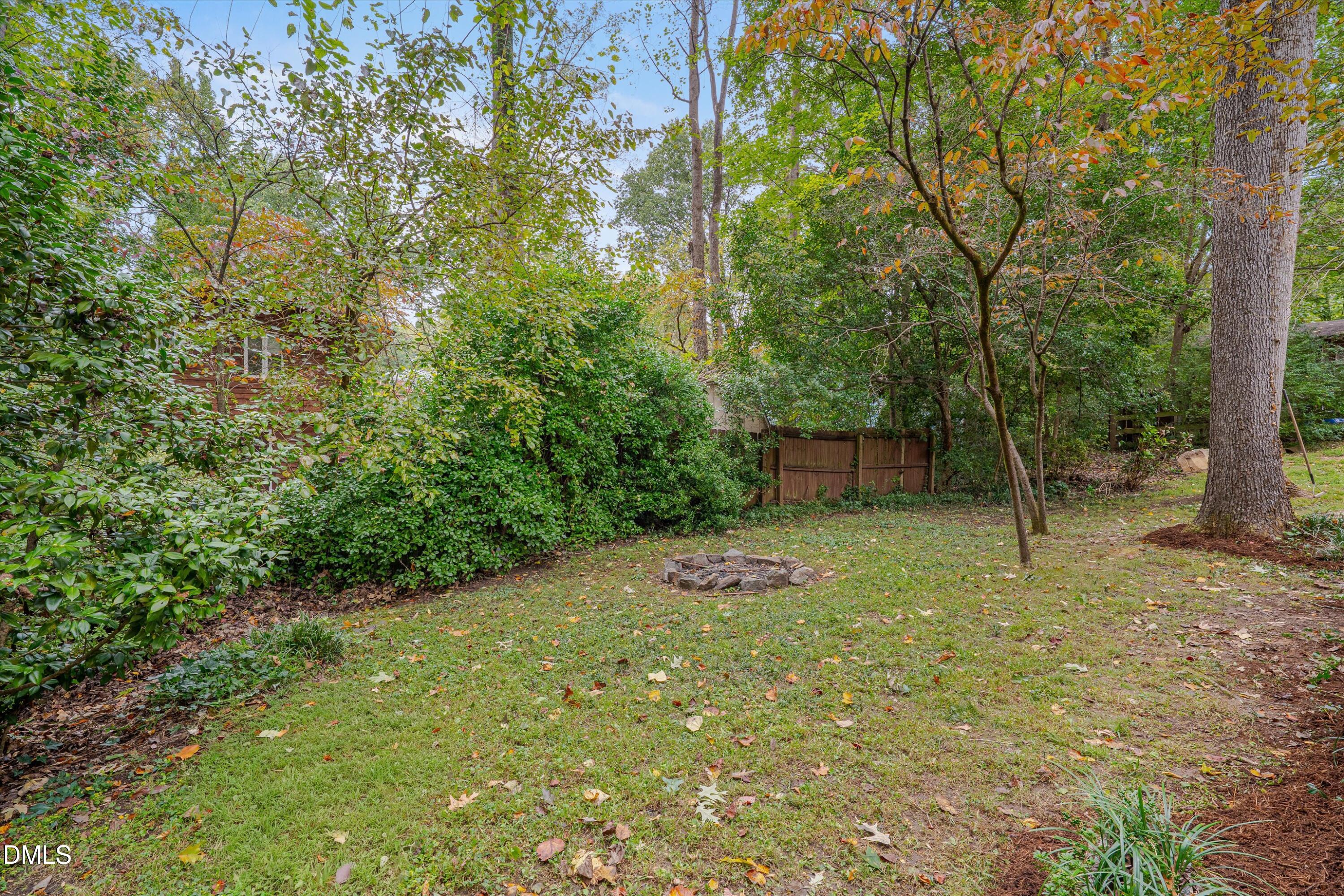 1617 Shawnee Street Durham, NC 27701 - Photo 48 of 56 a view of a backyard with large trees