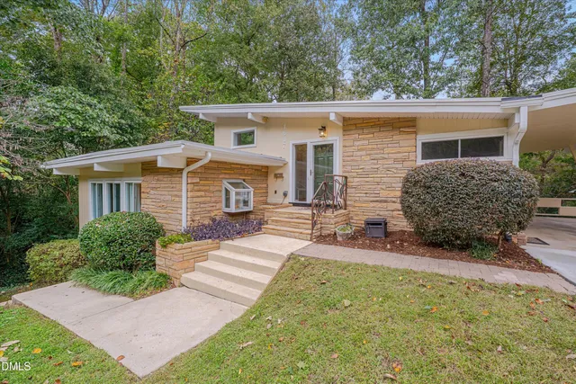 front view of a house with a patio