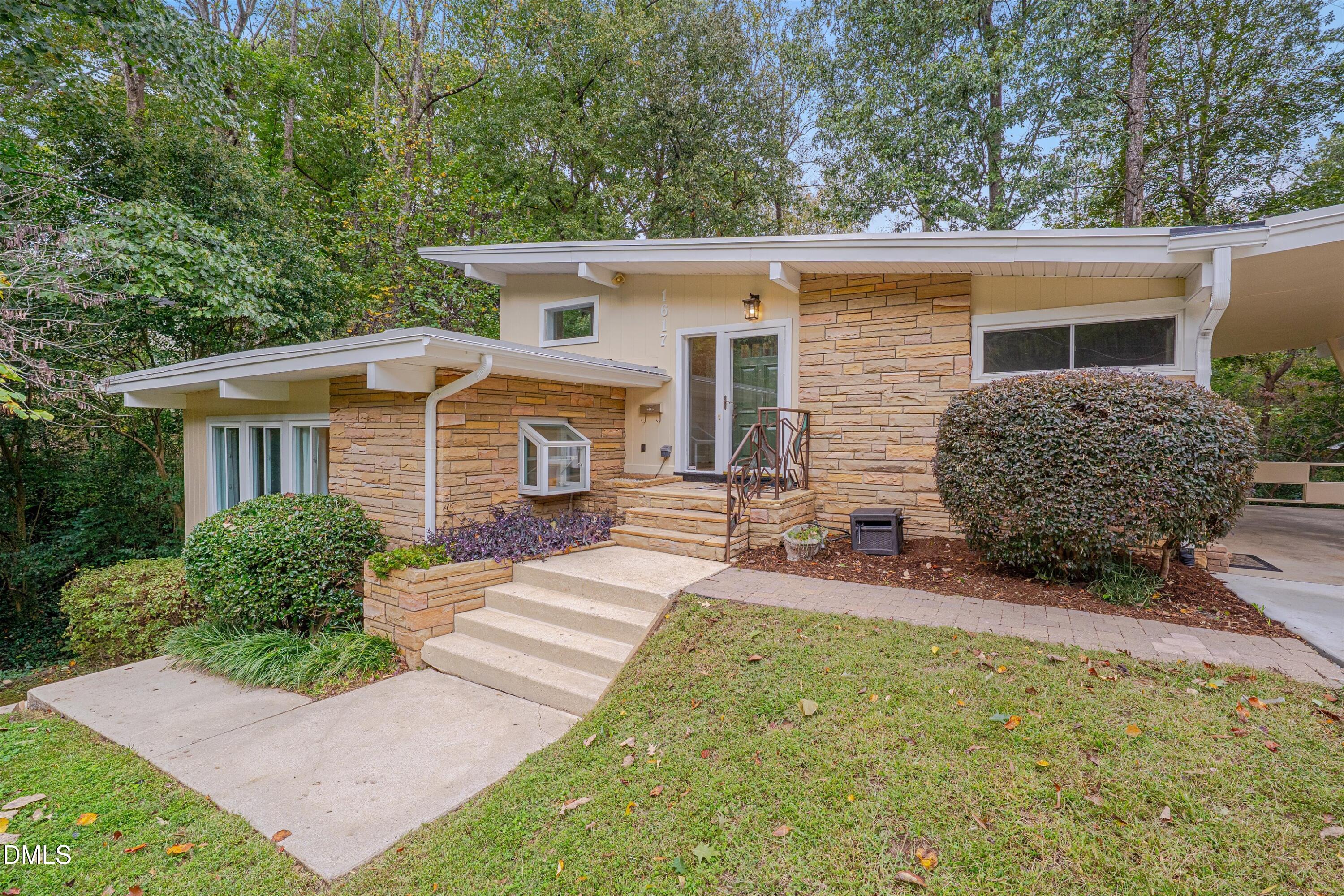 1617 Shawnee Street Durham, NC 27701 - Photo 5 of 56 front view of a house with a patio