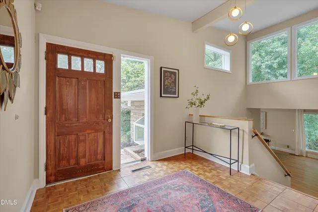a view of a livingroom with furniture and window