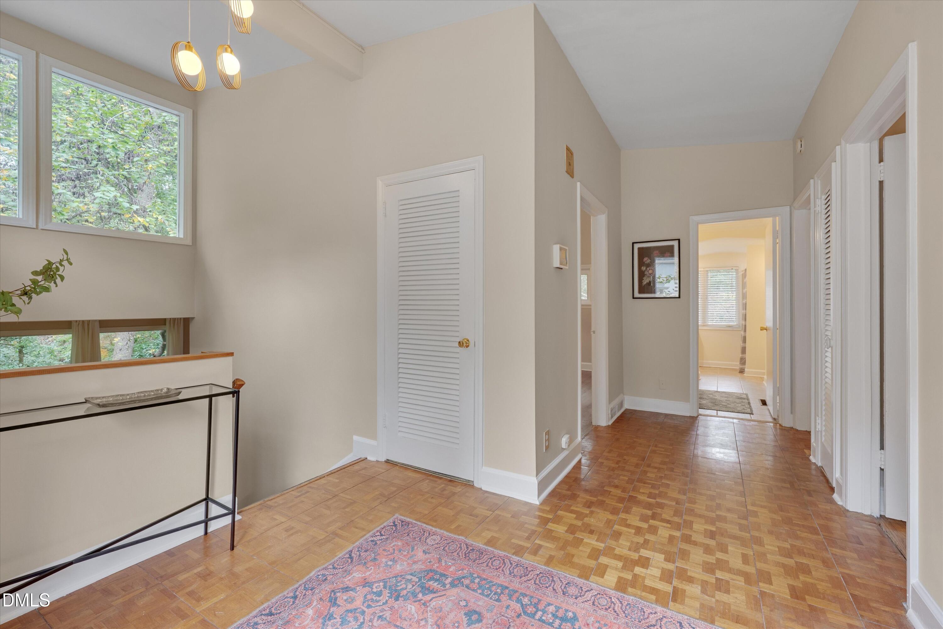 1617 Shawnee Street Durham, NC 27701 - Photo 7 of 56 a view of room with window and hardwood floor