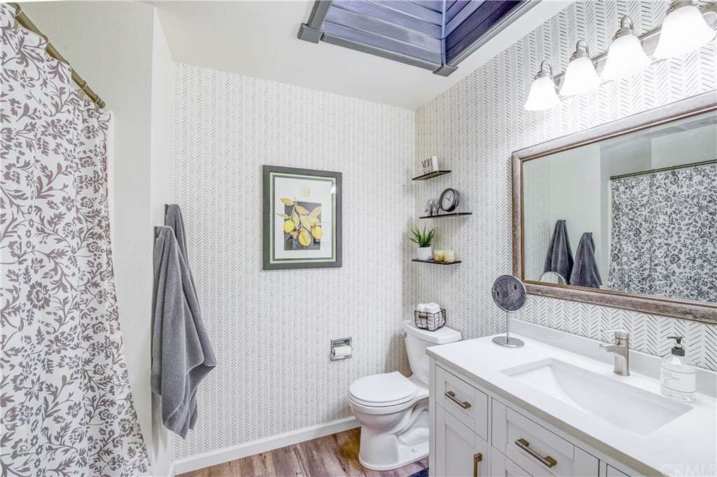 7 Forest Creek Circle Chico, CA 95928 - Photo 12 of 17 a bathroom with a sink toilet and vanity