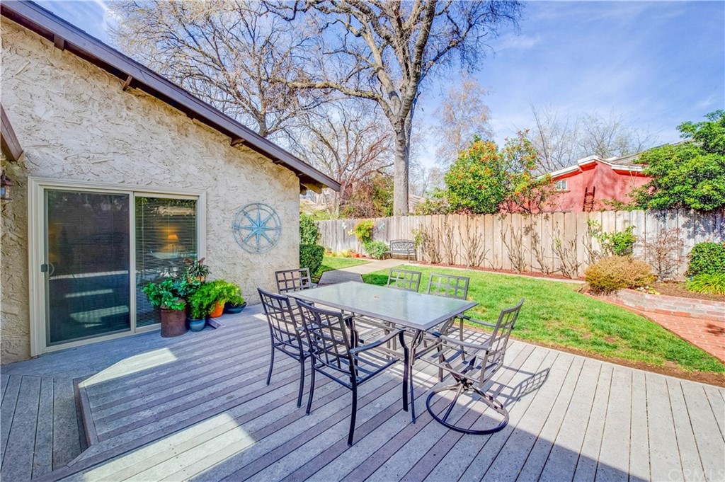 7 Forest Creek Circle Chico, CA 95928 - Photo 15 of 17 a view of a table and chairs in back yard of the house