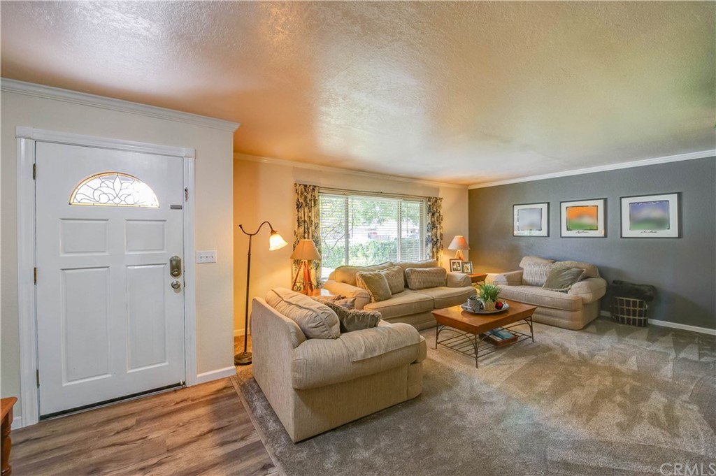 7 Forest Creek Circle Chico, CA 95928 - Photo 3 of 17 a living room with furniture and wooden floor