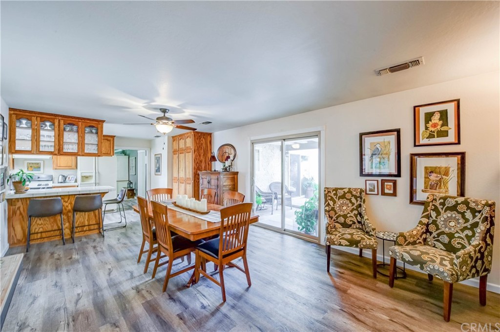 7 Forest Creek Circle Chico, CA 95928 - Photo 8 of 17 a dining room with furniture window and wooden floor