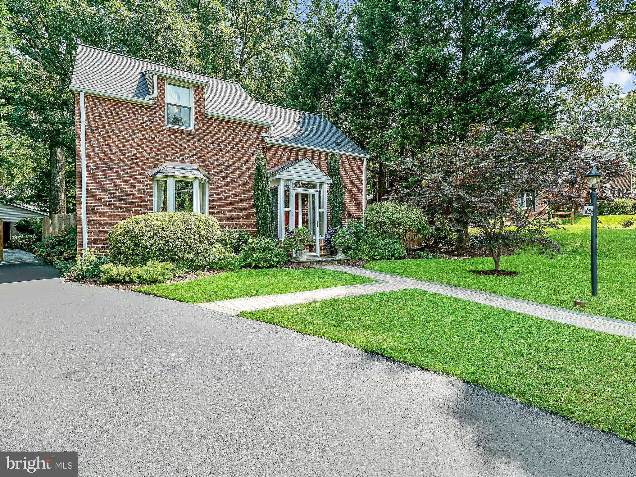 10205 Carson Place Silver Spring, MD 20901 - Photo 1 of 30 a front view of house with yard and green space