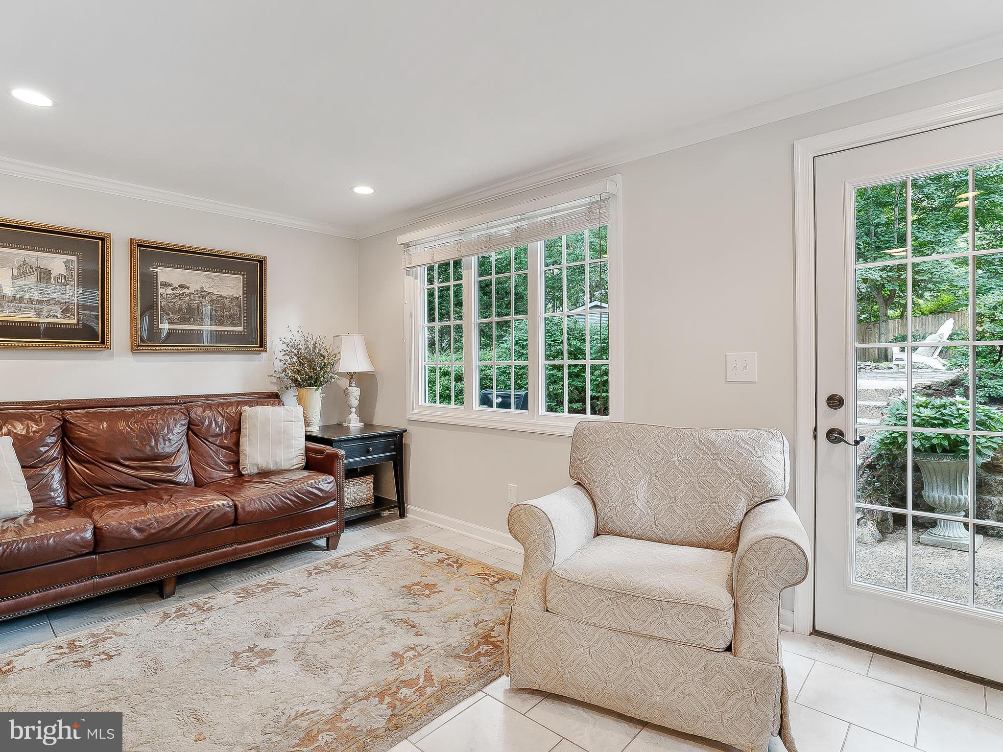 10205 Carson Place Silver Spring, MD 20901 - Photo 11 of 30 a living room with furniture and a large window