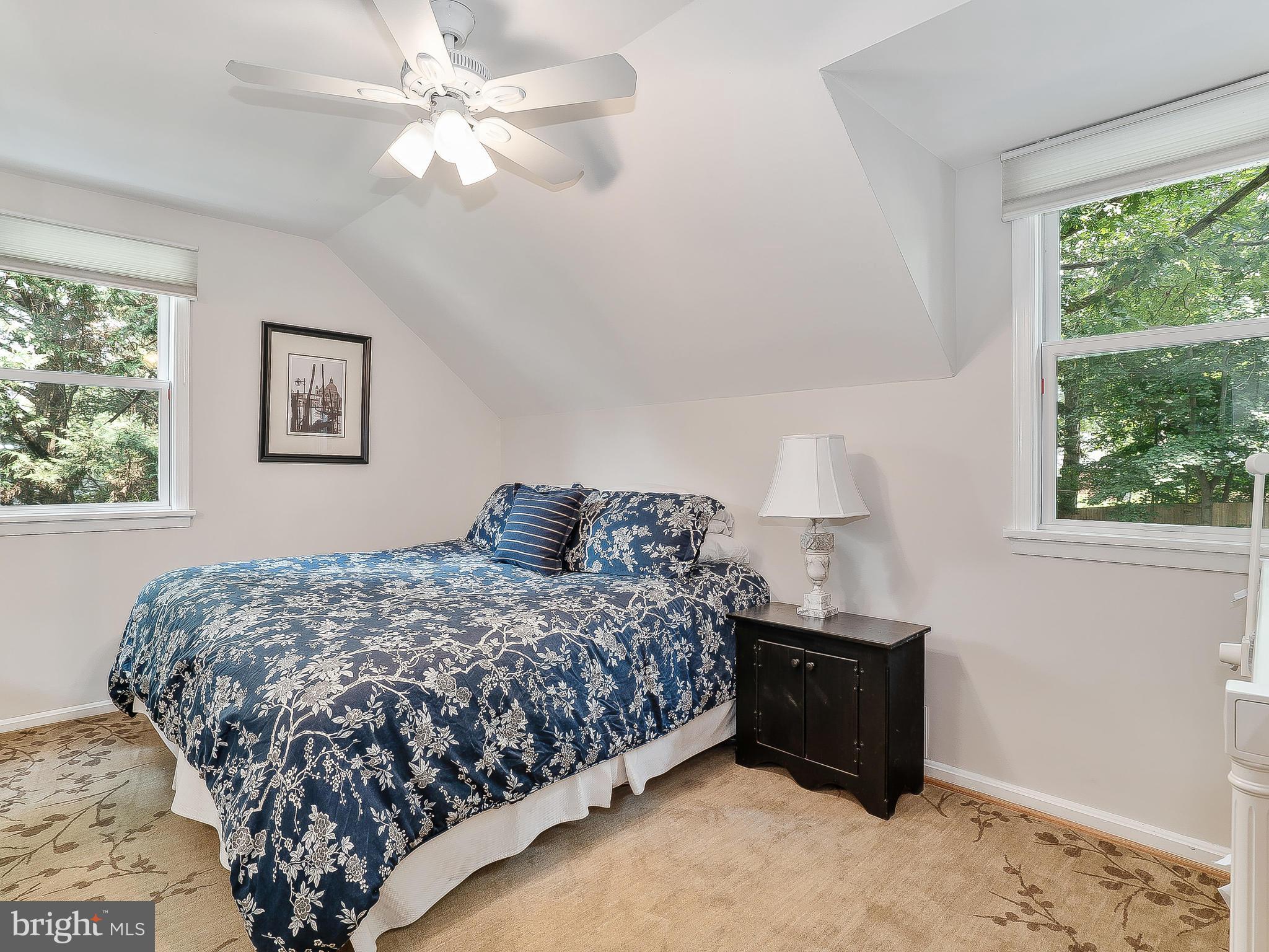 10205 Carson Place Silver Spring, MD 20901 - Photo 20 of 30 a bedroom with a bed and a window