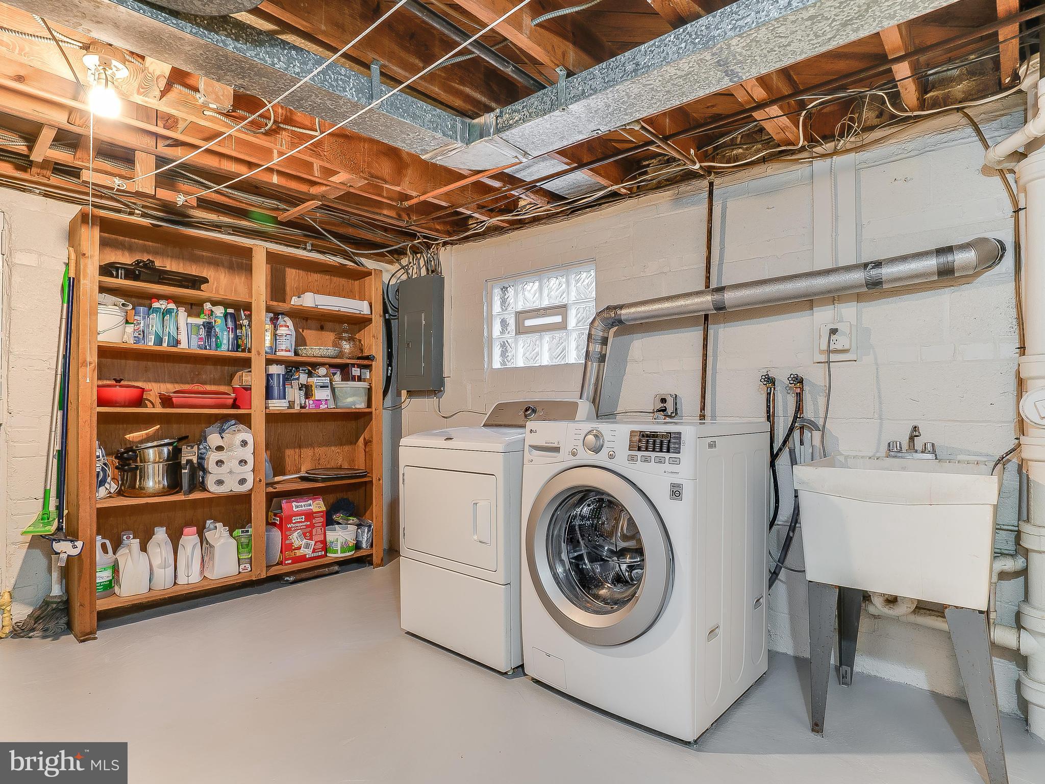 10205 Carson Place Silver Spring, MD 20901 - Photo 22 of 30 a utility room with dryer and washer