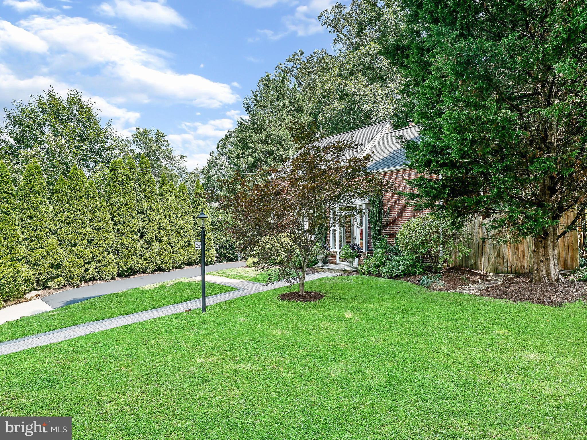 10205 Carson Place Silver Spring, MD 20901 - Photo 3 of 30 a view of a house with a yard