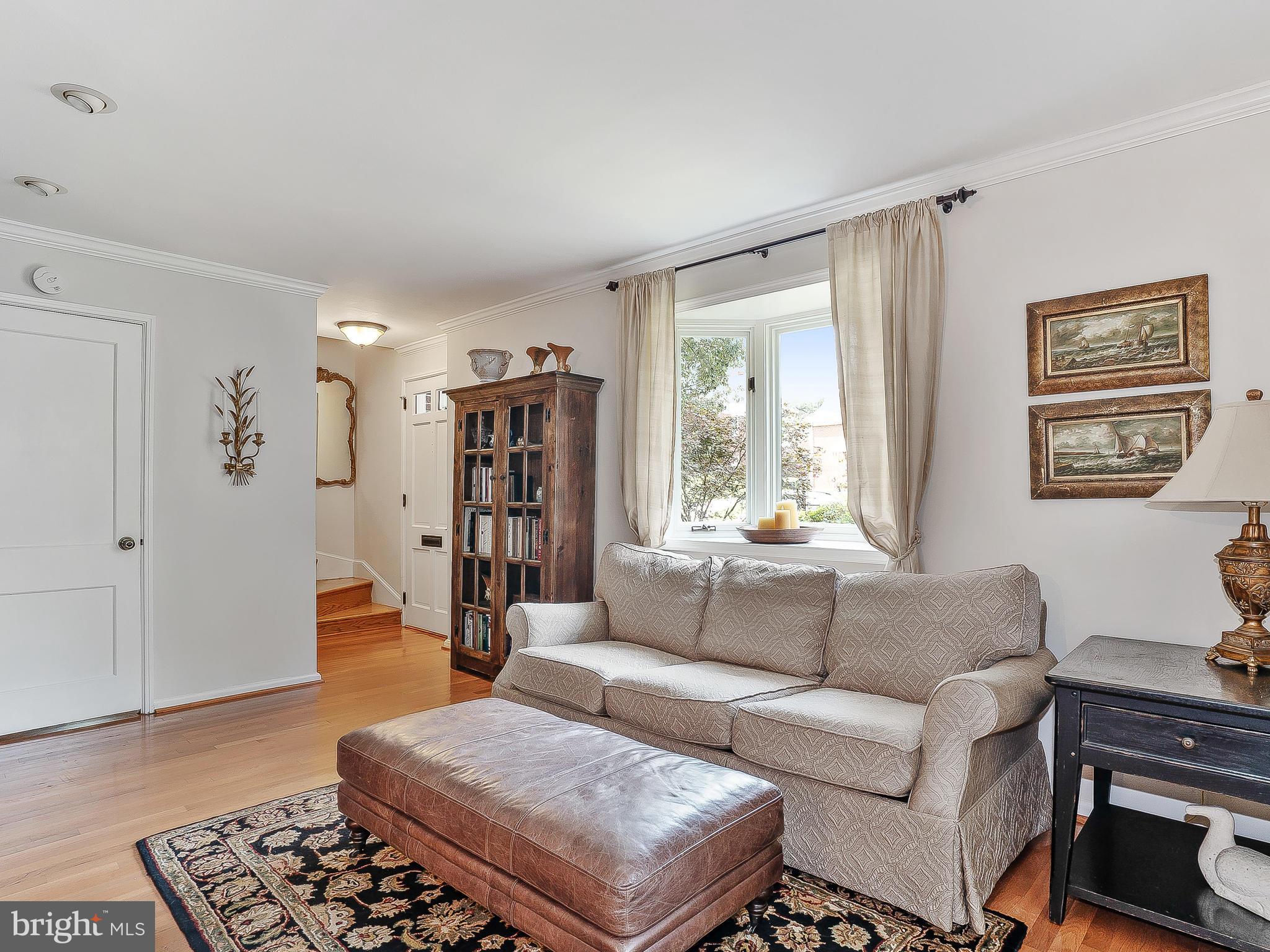 10205 Carson Place Silver Spring, MD 20901 - Photo 5 of 30 a living room with furniture and a window
